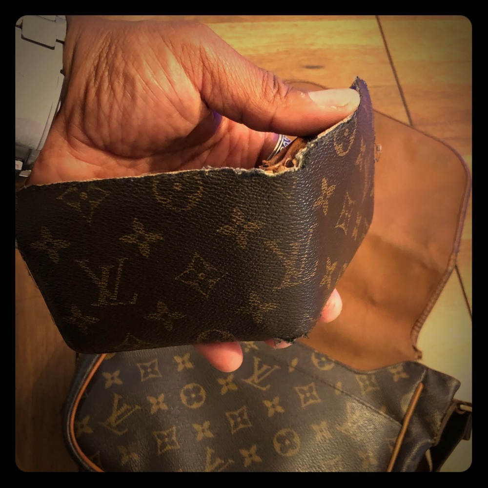 Authentic wallet. Some wear and tear but nice